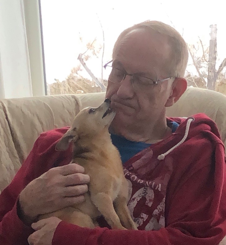 Dennis getting kisses from his gem