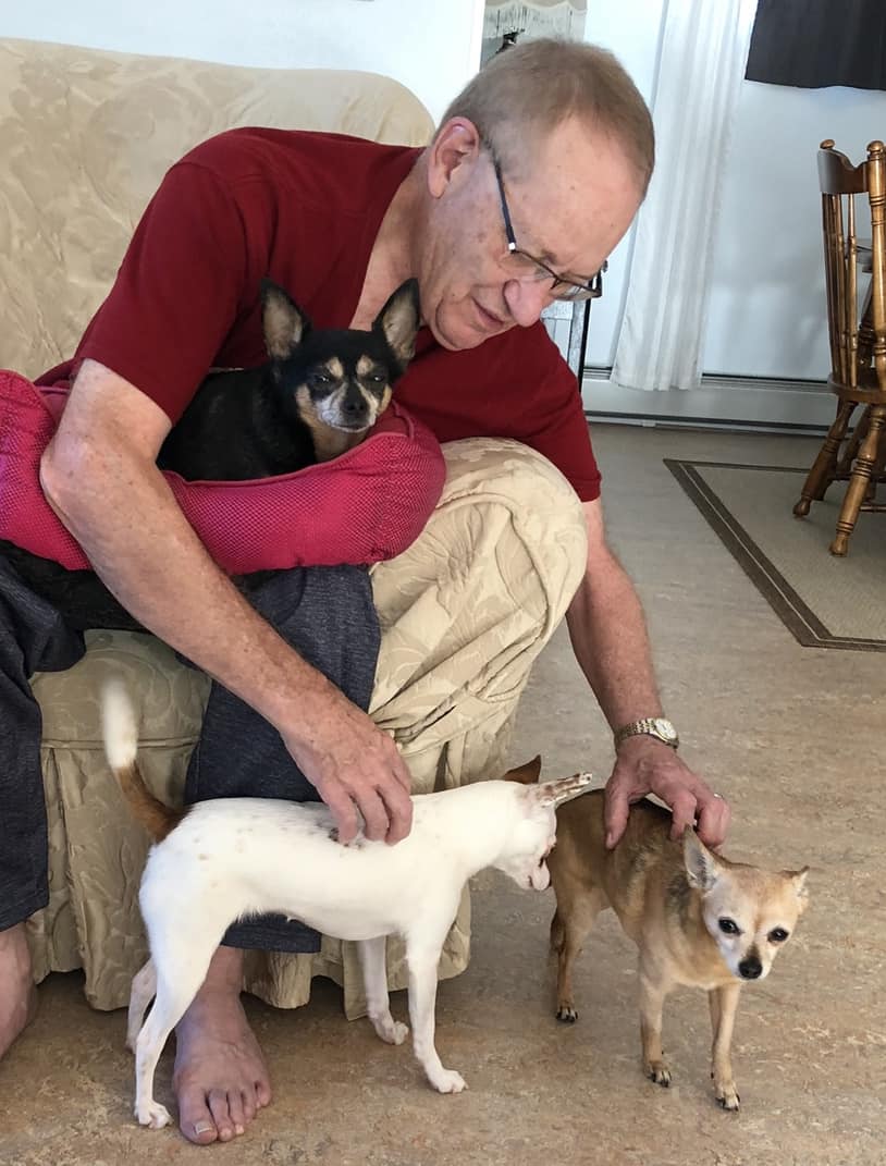 Dennis with all three gems at home